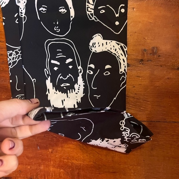 Urban Outfitters Shekou X-Small black pants with white faces EUC silky material - Picture 4 of 10